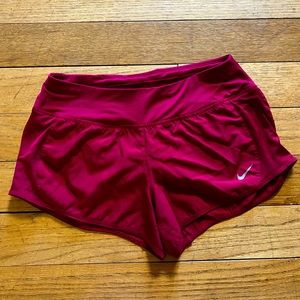 Nike | red running shorts